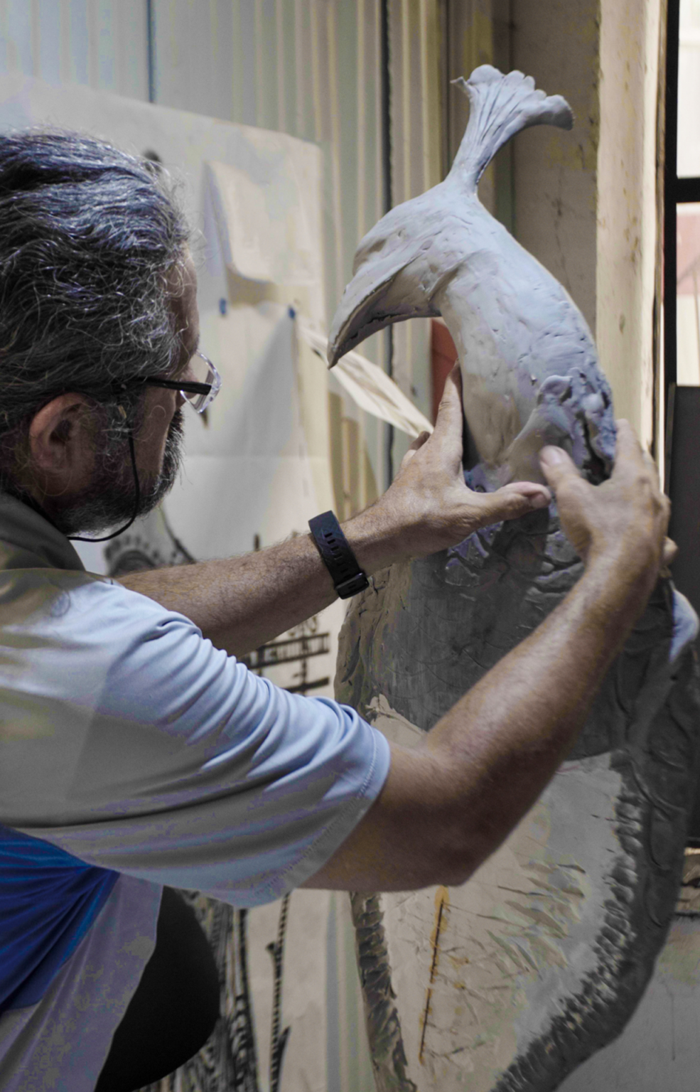 Maestro Louis Beltran hand-modeling the peacock