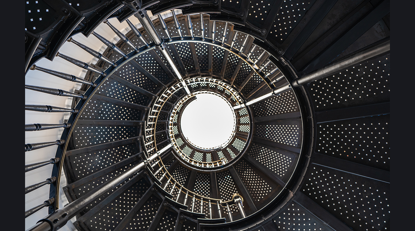 view from below of the sculptural spiral staircase